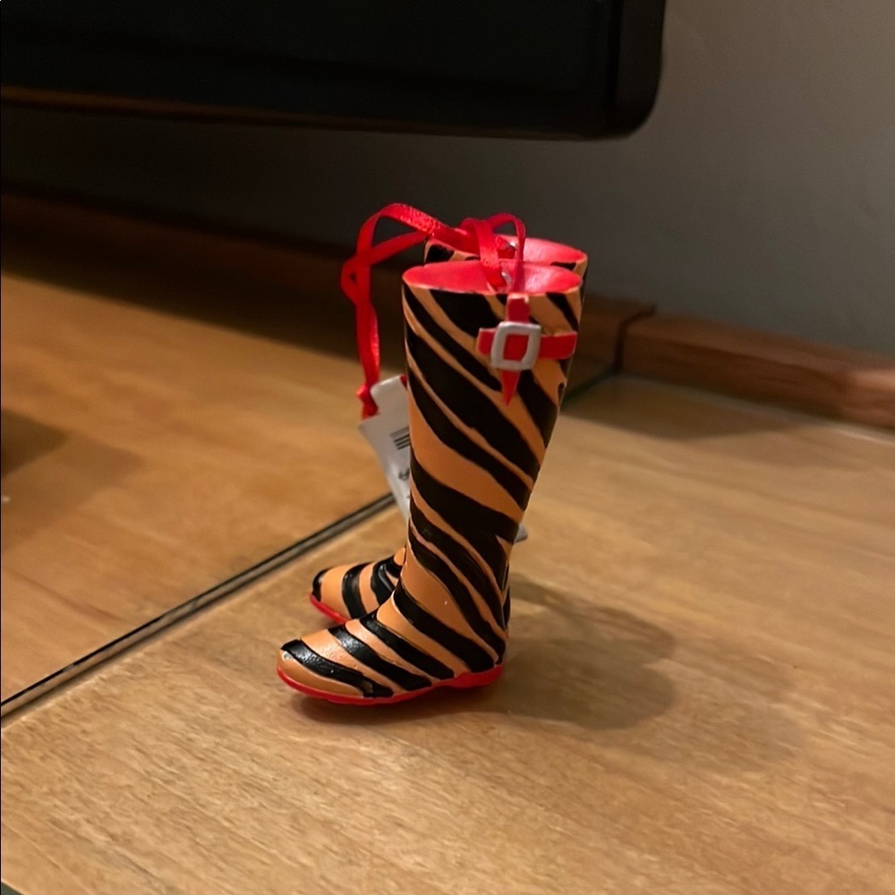 Orange and Black Heeled Boots with Zebra-Like Pattern